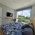 Bonito apartamento 2BD con Piscina Playa Xcalacoco